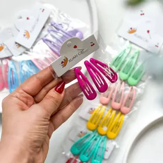 گیره مو تق‌تقی کودکانه طرح قلب رنگین‌کمانی ورق 30 عددی مدل XUAN CAI